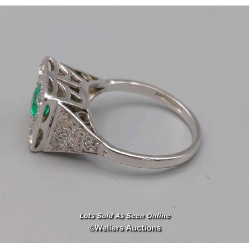 311 - Antique ring of Art Deco design, the central cushion cut emerald surrounded by old cut diamonds pave... 