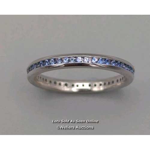 315 - Full eternity ring comprising round cut sapphires channel set in 18ct white gold. Width 2.6mm, ring ... 