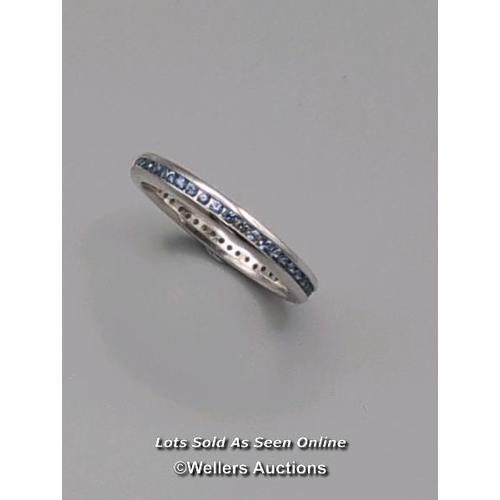 315 - Full eternity ring comprising round cut sapphires channel set in 18ct white gold. Width 2.6mm, ring ... 