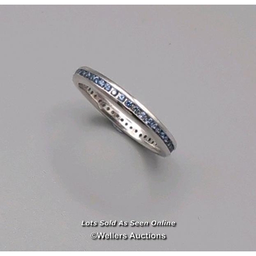 315 - Full eternity ring comprising round cut sapphires channel set in 18ct white gold. Width 2.6mm, ring ... 