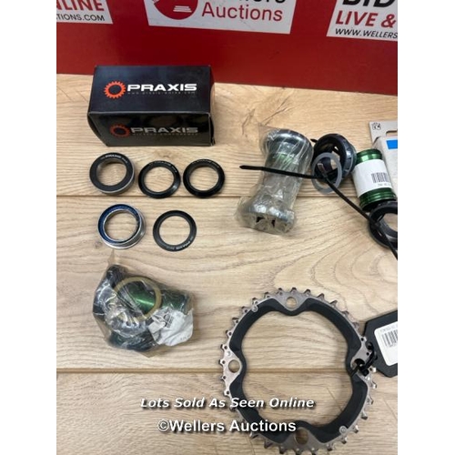 80 - MIXED LOT OF ASSORTED BICYCLE COMPONENTS INCL. SHIMANO CASSETTE SPROCKET, MEGAEVO BOTTOM BRACKET & P... 