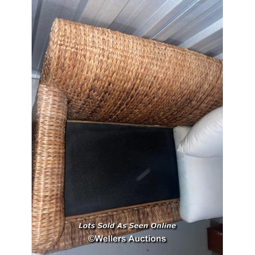 101 - Two seater wicker lounge with cushions, covers will need a clean, 78cm h x 186cm w x 90cm d / contai... 