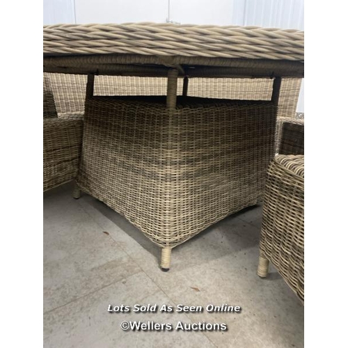 107 - Huge four piece outdoor rattan furniture suite, table measures 78cm h x 180cm dia, benches 95cm h x ... 