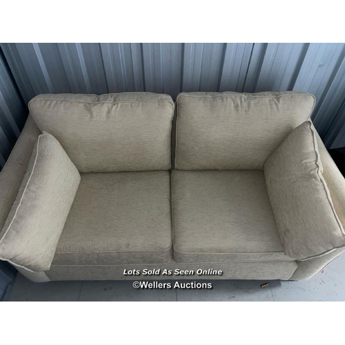 110 - Two seater upholstered cream colored sofa, cushions will need a clean, 95cm h x 180cm w x 100cm d / ... 