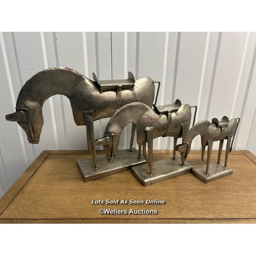 20 - Graduated set of three tin plate horses, largest 30cm h x 43cm l x 10cm d / titan storage solutions,... 