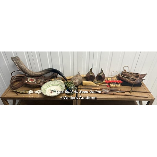 30 - African related ornaments and display pieces including, a horn, wind pipes, basket, and more / conta... 