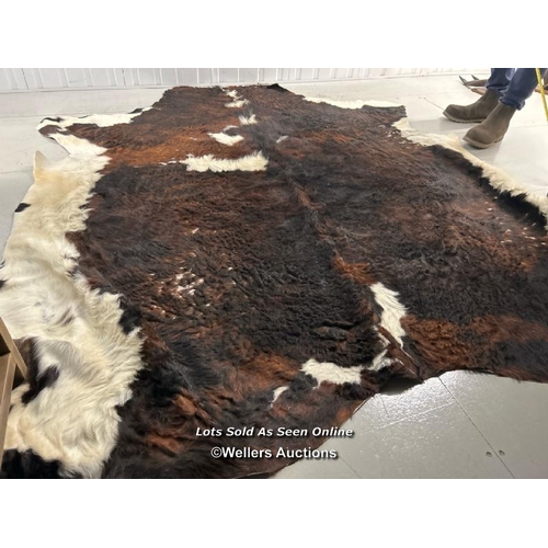 55 - Faux cow hide rug, 230cm long x 200cm w / container no: s207 / titan storage solutions, orchard busi... 