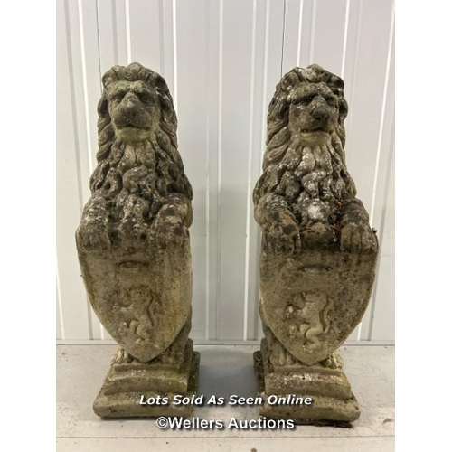 66 - Pair of weathered and pattinated armorial lions, 80cm / container no: s207 / titan storage solutions... 