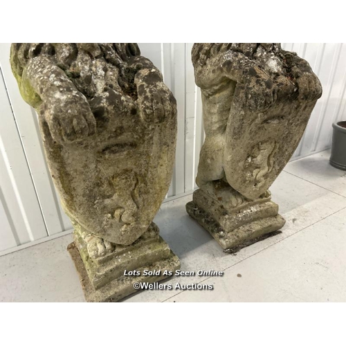 66 - Pair of weathered and pattinated armorial lions, 80cm / container no: s207 / titan storage solutions... 