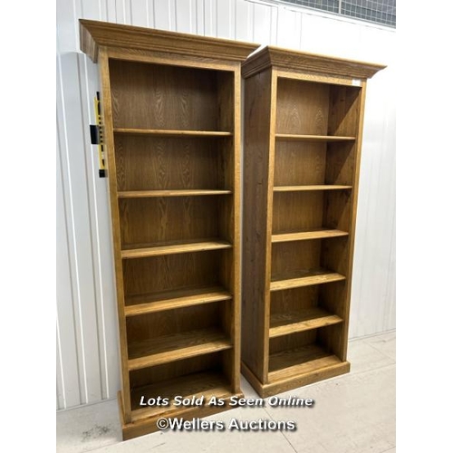 7 - Pair of modern oak bookshelf units, each with five internal shelves, 210cm h x 75cm w x 35cm d / tit... 