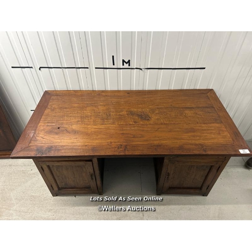 85 - Large oak desk, front support damaged and requires restoration, 79cm h x 165cm w x 80cm d / containe... 