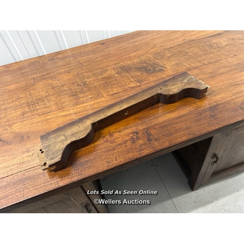 85 - Large oak desk, front support damaged and requires restoration, 79cm h x 165cm w x 80cm d / containe... 