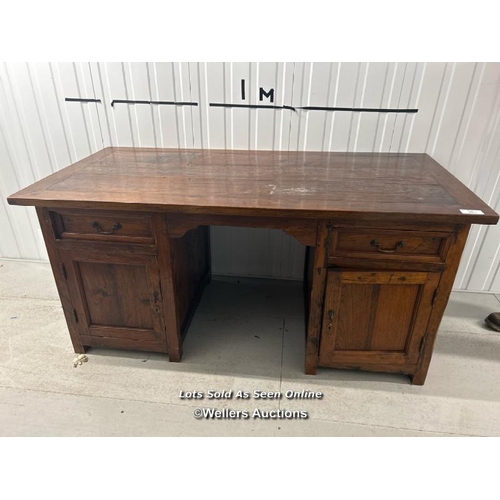 86 - Large oak desk with two cupboards and two drawers, in good condition, 79cm h x 165cm w x 80cm d / co... 