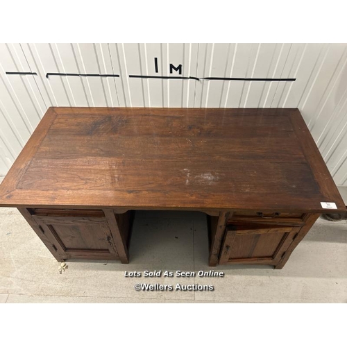 86 - Large oak desk with two cupboards and two drawers, in good condition, 79cm h x 165cm w x 80cm d / co... 