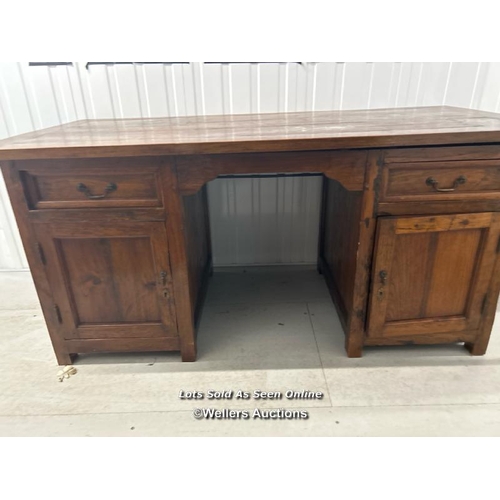 86 - Large oak desk with two cupboards and two drawers, in good condition, 79cm h x 165cm w x 80cm d / co... 