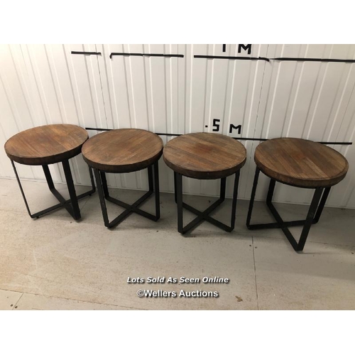 96 - Four matching side tables with wooden tops and heavy metal bases, 53cm h x 50cm dia / container no: ... 