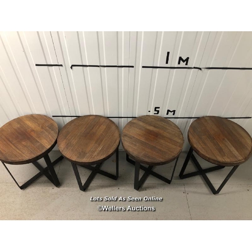 96 - Four matching side tables with wooden tops and heavy metal bases, 53cm h x 50cm dia / container no: ... 