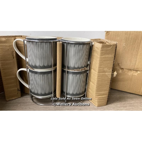 53 - OAKLEY GREY MUGS / APPEARS NEW   / C25