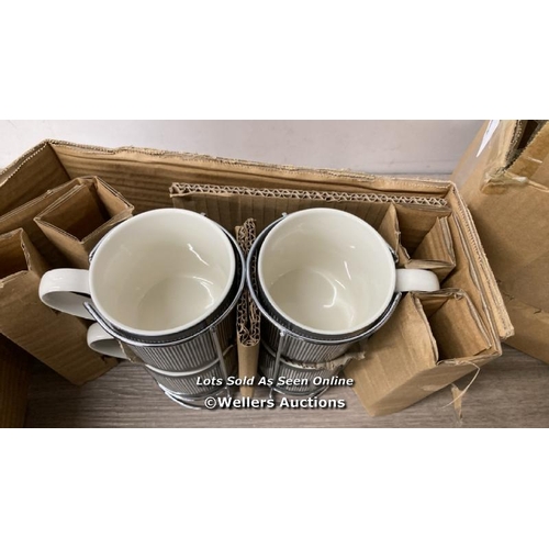 53 - OAKLEY GREY MUGS / APPEARS NEW   / C25