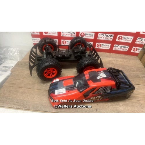 1080 - RADIO CONTROLLED MONSTER TRUCK / WITH REMOTE / SIGNS OF USE / E60