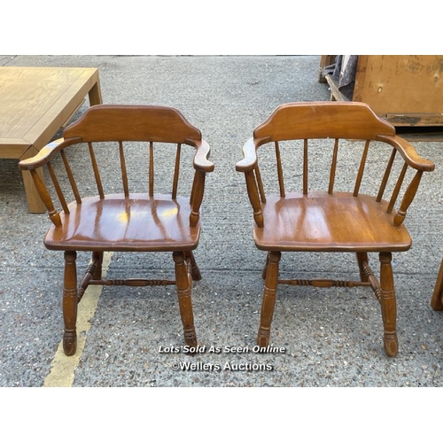 38 - Two pine stick back captains chairs, 78cm h x 64cm w x 48cm d / Container no: BM000829