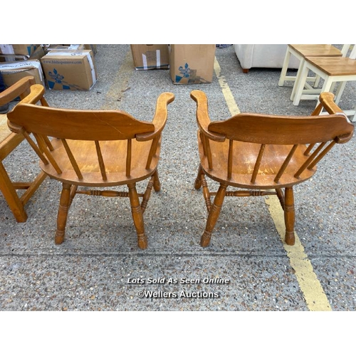 38 - Two pine stick back captains chairs, 78cm h x 64cm w x 48cm d / Container no: BM000829