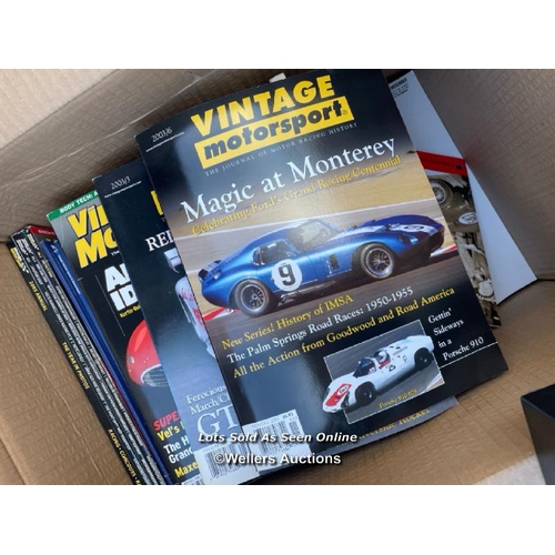 43 - Box of assorted car related books and vintage magazines with an Audi car trophy sytle ornament / Con... 