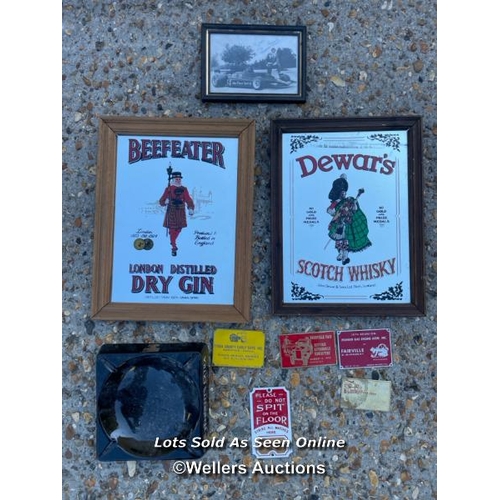 66 - Vintage pub memorabilia including advertising mirrors for Beefeater gin, Dewar's scotch whisky, and ... 