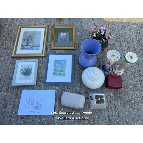 68 - Assorted decorative items including porcelain candle stick holders, prints, faux flowers etc / Conta... 