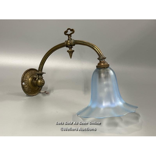 64 - Ornate brass wall light with blue tulip style shade, 31cm long  / AN12