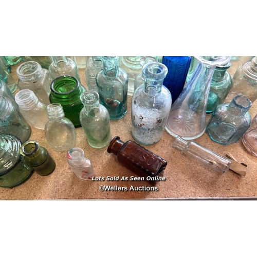 74 - A large collections of vintage glass apothecary bottles, perfume bottles and ink bottles / AN23