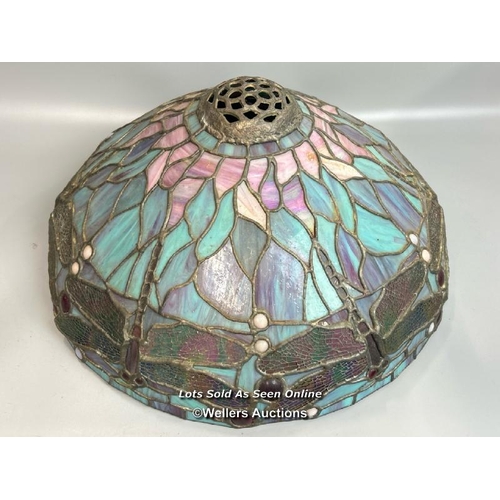 75 - A large Tiffany style stained glass, leaded lamp shade on metal base. Lamp shade decorated with Drag... 