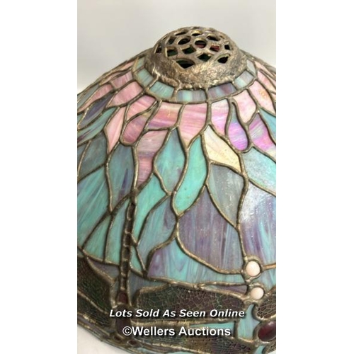 75 - A large Tiffany style stained glass, leaded lamp shade on metal base. Lamp shade decorated with Drag... 