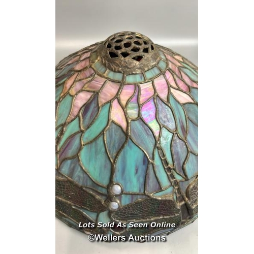 75 - A large Tiffany style stained glass, leaded lamp shade on metal base. Lamp shade decorated with Drag... 