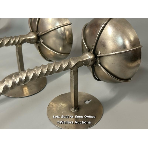 76 - Four twisted metal wall hanging candle holders, each 58cm high / AN13