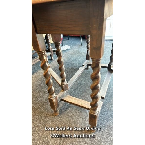 83 - Antique drop leaf table with twisted supports, table top 119 x 90cm (open) 74cm high