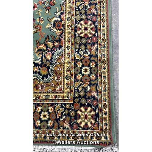 95 - A large floral rug, 277 x 198cm