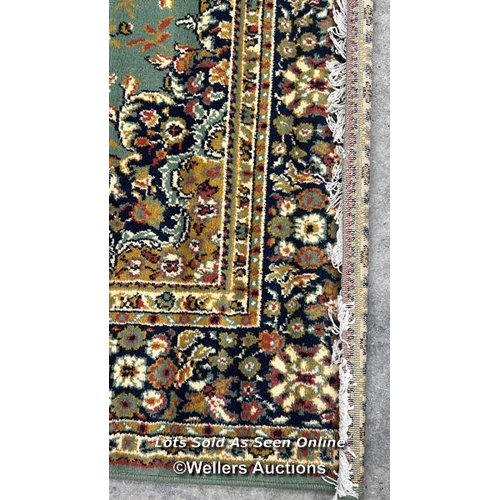 95 - A large floral rug, 277 x 198cm