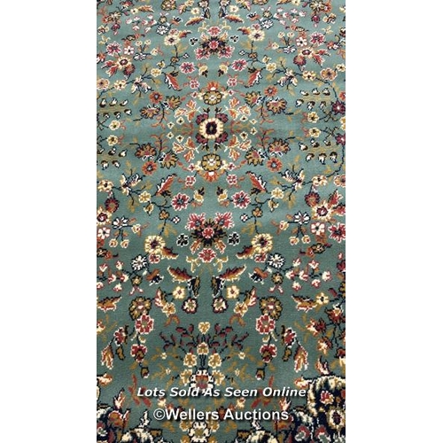 95 - A large floral rug, 277 x 198cm