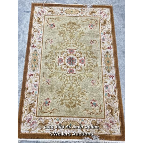 98 - Oriental style floral rug, 186 x 122cm