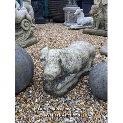 84 - a0075 Medium reconstituted stone laying pig, H:23cm x L:52cm