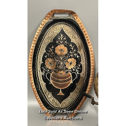 132 - A highly decorated copper samovar, teapot, trays, bowl and cup surrounds, samovar and teapot 49cm hi... 