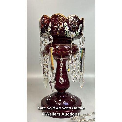 138 - A victorian ruby red mantle lustre with crystal drops, and some spares, 35.5cm high / AN19