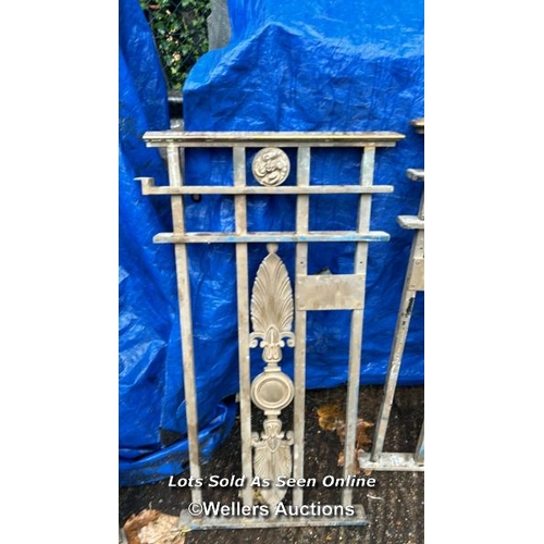 141 - Decorative wrought iron and brass gate parts previously used at Harrods, each set 130 x 90cm