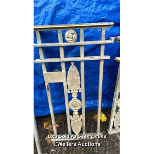 141 - Decorative wrought iron and brass gate parts previously used at Harrods, each set 130 x 90cm