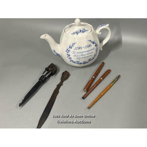 180 - Mixed lot including vintage pens, carved letter openers and commemorative teapot / AN27