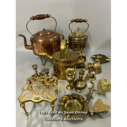 181 - Brass and copperware including large copper teapot, candle holders and decorative items / AN27