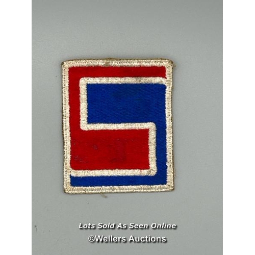 64 - A WW2 69th Infantry Division shoulder patch presented to Michael Booker by P.F.C. Alan H. Murphey, o... 