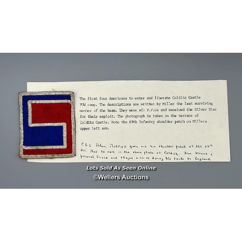 64 - A WW2 69th Infantry Division shoulder patch presented to Michael Booker by P.F.C. Alan H. Murphey, o... 