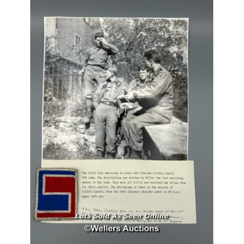 64 - A WW2 69th Infantry Division shoulder patch presented to Michael Booker by P.F.C. Alan H. Murphey, o... 